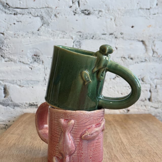 Couples that love their cats so much they put it on their mugs > 